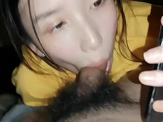 Chinese couple while talking phone with her mum